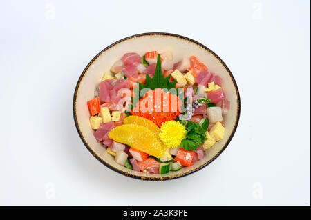 Donburi variety diced raw fish with vegetable set on japanese rice in bowl Stock Photo