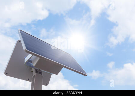 Solar cell or Solar Panel setup outdoor sunny day blue sky background with space for text Stock Photo