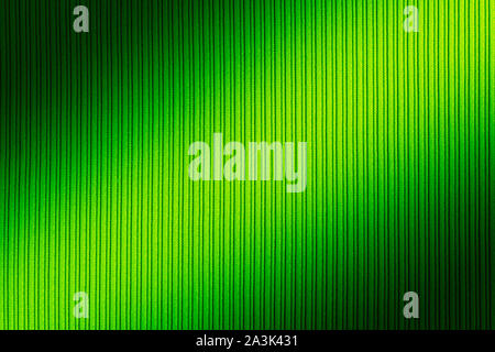 Decorative background green color, striped texture diagonal gradient. Wallpaper Art. Design Stock Photo