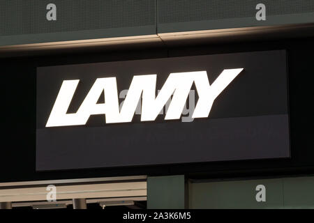 Shenzhen, Guangdong, China. 7th Oct, 2019. Leather luxury goods brand MCM  logo seen in Shenzhen Bao'an International Airport. Credit: Alex Tai/SOPA  Images/ZUMA Wire/Alamy Live News Stock Photo - Alamy