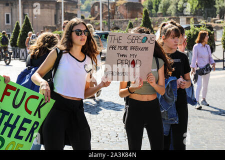 27 Sep 2019. Fridays for future. School strike for climate. Italian teenagers holding a placard in Rome, Italy.