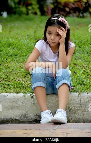 Worried Asian Person Stock Photo