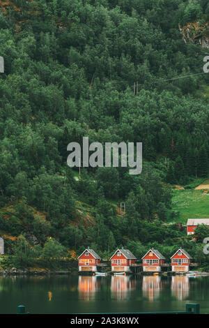 Flam, Norway. Famous Red Wooden Docks In Summer Evening. Small Tourist Town Of Flam On Western Side Of Norway Deep In Fjords. Famous Norwegian Landmar Stock Photo