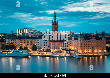 Stockholm, Sweden. Scenic View Of Stockholm Skyline At Summer Evening. Famous Popular Destination Scenic Place In Dusk Lights. Riddarholm Church In Ni Stock Photo