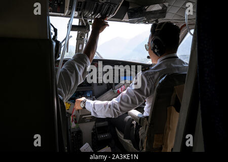 On board of Tara Air's DHC-6 Twin Otter on flight from Jomsom to Pokhara, Nepal Stock Photo