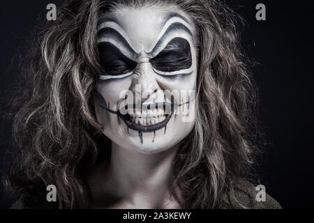 Halloween creative make up, smiling. Stock Photo