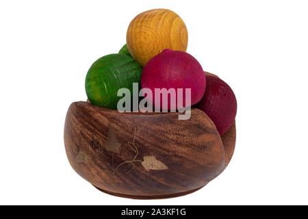 Scented wooden balls. Closeup of the air freshener in a brown wooden bowl made of wooden balls   and aromatized with essential oils. Macro of a nice g Stock Photo