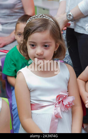 Birthday two years in the kindergarden . Children's birthday with animators . Happy group of children at a birthday celebration dressed in the style Stock Photo