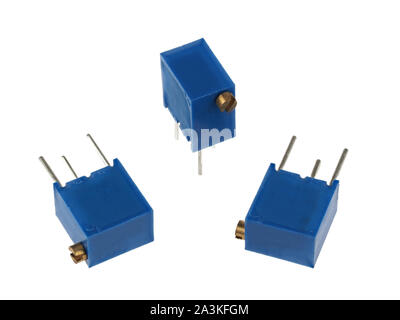 Close-up view of a group of adjustable trimmer potentiometers, isolated on a white background Stock Photo