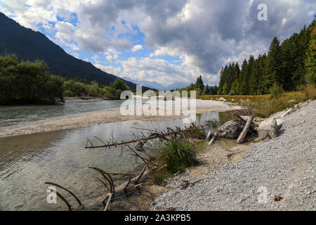 Mountain landscape with a small river in the Alps Stock Photo