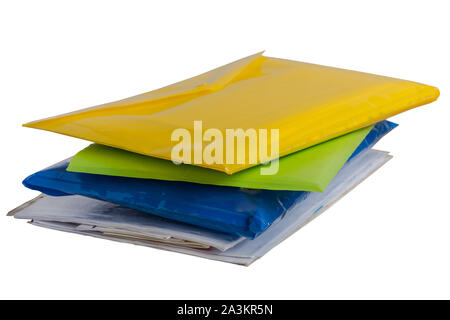 Stack of colorful folders with documents isolated on white background. Office workplace. Stock Photo