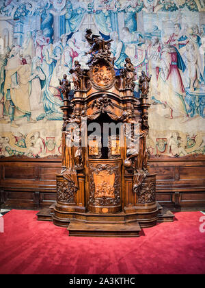 Wooden confessional with carved sculptures inside the basilica of Santa Maria Maggiore in Bergamo Citta Alta Stock Photo