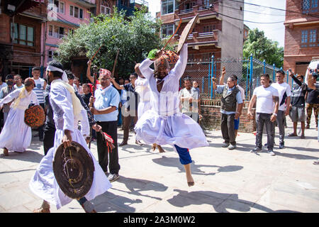 Bhaktapur, Nepal. 09th Oct, 2019. A man attired as a warrior performs a traditional ritual dance during Khadga Jatra in Thimi, Nepal on October 9, 2019. (Photo by Rojan Shrestha/Pacific Press) Credit: Pacific Press Agency/Alamy Live News Stock Photo