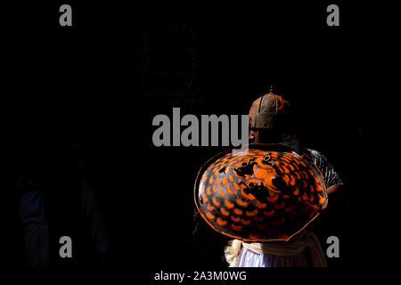 Bhaktapur, Nepal. 09th Oct, 2019. A LowKey picture of a man attired as a warrior during khadga Jatra at Thimi, Nepal on October 09, 2019. (Photo by Rojan Shrestha/Pacific Press) Credit: Pacific Press Agency/Alamy Live News Stock Photo