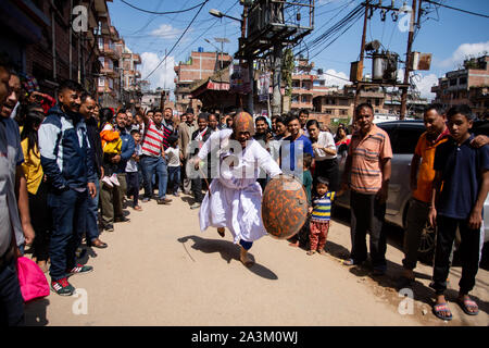 Bhaktapur, Nepal. 09th Oct, 2019. A man attired as a warrior performs a traditional ritual dance during Khadga Jatra in Thimi, Nepal on October 9, 2019. (Photo by Rojan Shrestha/Pacific Press) Credit: Pacific Press Agency/Alamy Live News Stock Photo