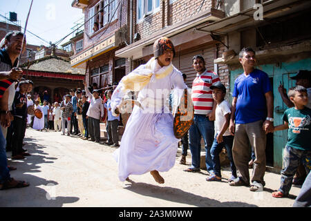 Bhaktapur, Nepal. 09th Oct, 2019. A man attired as a warrior performs a traditional ritual dance during Khadga Jatra in Thimi, Nepal on October 9, 2019. (Photo by Rojan Shrestha/Pacific Press) Credit: Pacific Press Agency/Alamy Live News Stock Photo