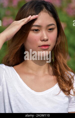 A Beautiful Minority Female Saluting Stock Photo - Alamy
