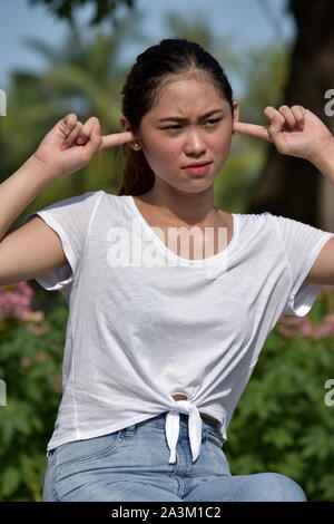 Youthful Filipina Female And Silence Stock Photo