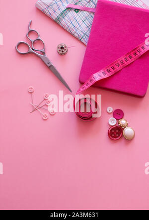 Pink composition of sewing objects Stock Photo