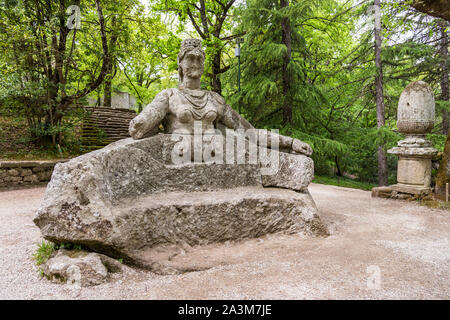 Stone sculpture at famous Monsters park, also named Sacred Grove or Gardens of Bomarzo in Bomarzo, Viterbo, northern Lazio, Italy Stock Photo