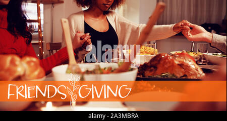 Composite image of happy friendsgiving Stock Photo
