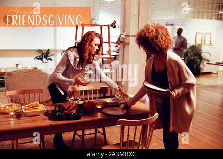 Composite image of happy friendsgiving Stock Photo