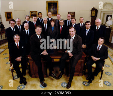 'Class Photo' of 1981 Reagan Cabinet taken in the Oval at the White House in Washington, DC on Wednesday, February 4, 1981. From left to right, front row: Alexander M. Haig, Secretary of State; United States President Ronald Reagan; U.S. Vice President George H.W. Bush; and Caspar W. Weinberger, Secretary of Defense. From left to right, second row: Raymond J. Donovan, Secretary of Labor; Donald T. Regan, Secretary of the Treasury; Terrel H. Bell, Secretary of Education; David Stockman, Director, Office of Management and Budget; Andrew L. Lewis, Secretary of Transportation; Samuel R. Pierce, Stock Photo