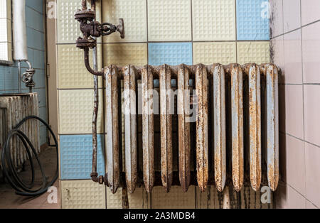 Old radiator in the room Stock Photo