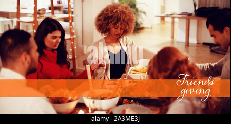 Composite image of happy friendsgiving Stock Photo