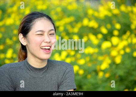 Winking Beautiful Minority Female Stock Photo