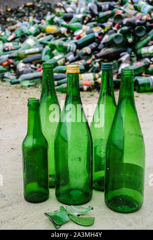 Green glass bottles recycling yard Stock Photo