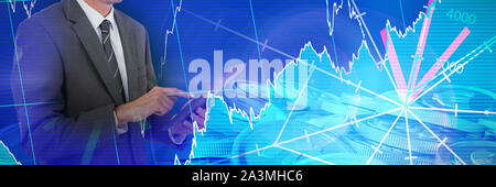 Composite image of midsection of sophisticated businessman using digital tablet Stock Photo