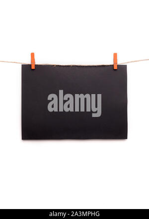 Chalkboard with copy space for text hanging on rope on white Stock Photo