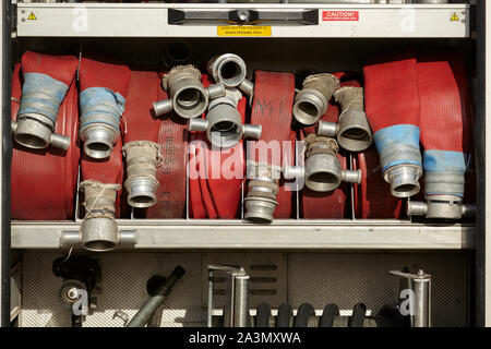 Fire Hoses at the back of a Fire Engine Stock Photo