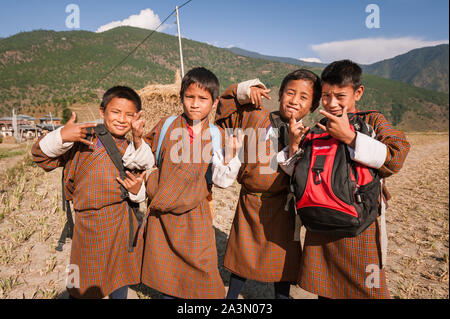 Punakha, Bhutan, 07 Nov 2011: Happy school children posing and smiling. Stock Photo