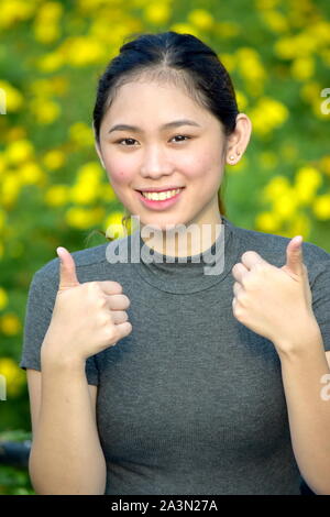 Woman With Thumbs Up Stock Photo