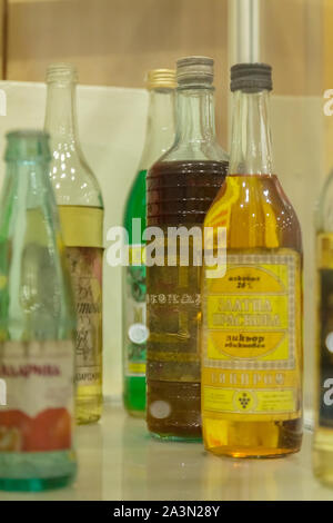 Museum of Cars of Socialism - Peshtera, Pazardzhik Region, Bulgaria -October 10, 2019. Old bottles of alcohol and soft drinks from the time of sociali Stock Photo