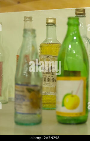 Museum of Cars of Socialism - Peshtera, Pazardzhik Region, Bulgaria -October 10, 2019. Old bottles of alcohol and soft drinks from the time of sociali Stock Photo