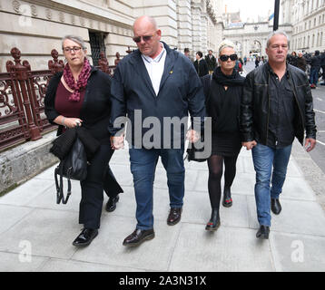 The family of Harry Dunn, mother Charlotte Charles (second right) and father Tim Dunn (second left) leaving the Foreign and Commonwealth Office in London, where they met Foreign Secretary Dominic Raab. 19-year-old Harry was killed when his motorbike crashed into a car on August 27. The suspect in the case, 42-year-old Anne Sacoolas, was granted diplomatic immunity after the crash, but Prime Minister Boris Johnson, Mr Raab and Northamptonshire Police have asked the US to consider waiving it. PA Photo. Picture date: Wednesday October 9, 2019. See PA story POLICE Diplomat. Photo credit should rea Stock Photo