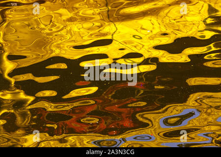 Colorful abstract reflection on water surface Stock Photo