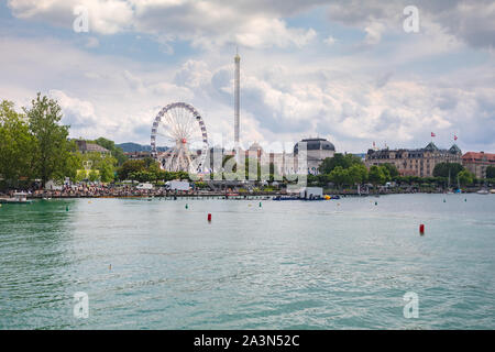 View with Lake Zurich with Opera house and  a Big round wheel in background. in Zurich city, Switzerland Stock Photo