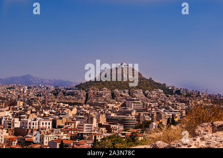 Beautiful landscape view of Athens, Greece on a sunny day with no clouds, with a big church in the center of the city Stock Photo
