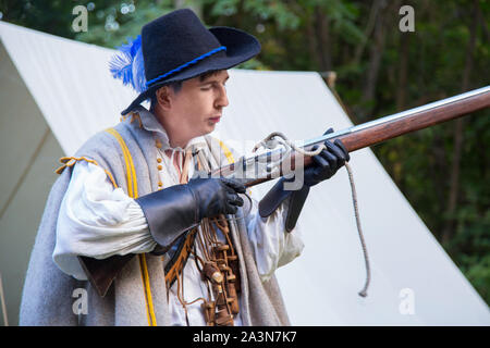 Old musket gun in male hand isolated on white background Stock Photo ...
