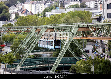 The Wuppertaler Schwebebahn, train of the newest generation 15, downtown, shortly before the station Hauptbahnhof, ride over the Wupper, Wuppertal, Ge Stock Photo