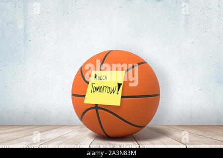 3d close-up rendering of a basketball on wooden floor, with yellow sticky note on ball that reads 'Match tomorrow' Stock Photo