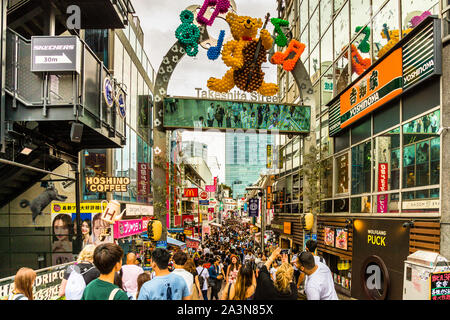 Crowds of people throng Takeshita Street in Tokyo, Japan. A shopper's paradise for all things cute and kitschy Stock Photo