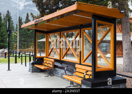 One of the many well constructed bus stop shelters in the mountain town of Banff Alberta Canada Stock Photo