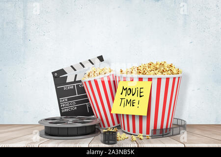 3d rendering of film reel, clapperboard and two pop corn buckets, with post-it note 'Move Time' on one of them. Stock Photo