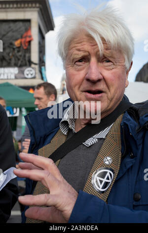 Stanley Johnson, the father of Prime Minister Boris Johnson joins environmental activists protesting about Climate Change during an occupation of Trafalgar Square in central London, the third day of a two-week prolonged worldwide protest by members of Extinction Rebellion, on 9th October 2019, in London, England. Stock Photo