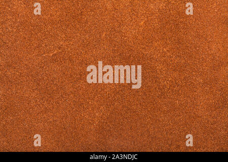 textured background from orange brown suede close up Stock Photo